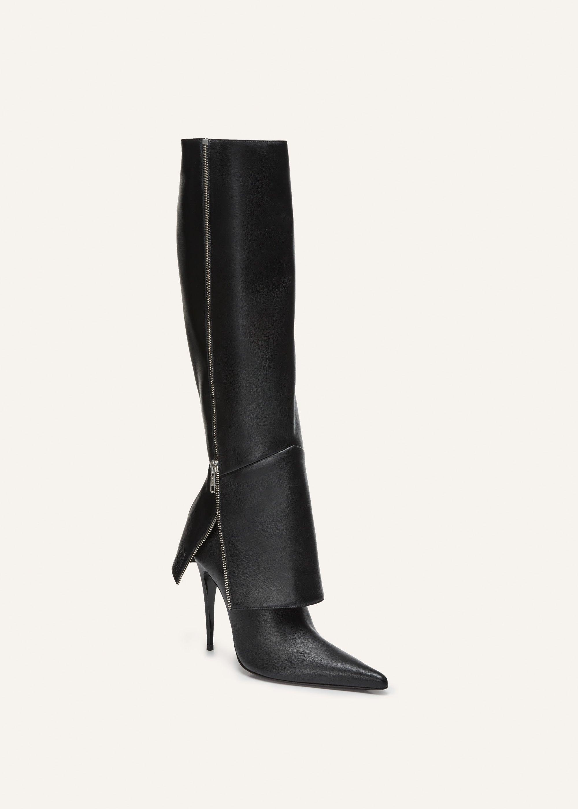 Exposed zipper boots in black leather Product Image