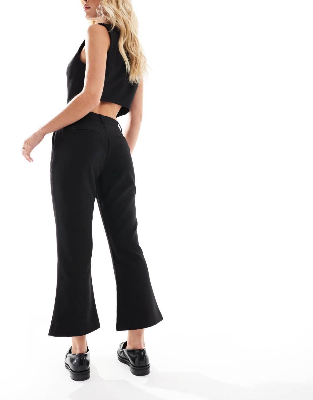 ASOS DESIGN Petite zip front tailored slim leg pants in black Product Image