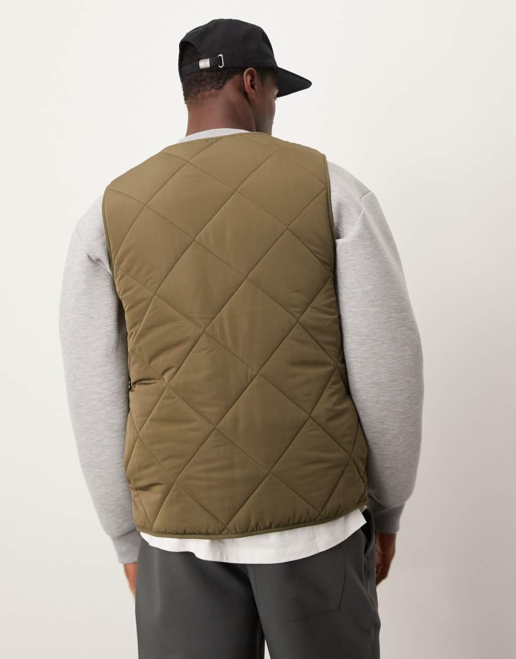 ASOS DESIGN quilted vest in khaki Product Image