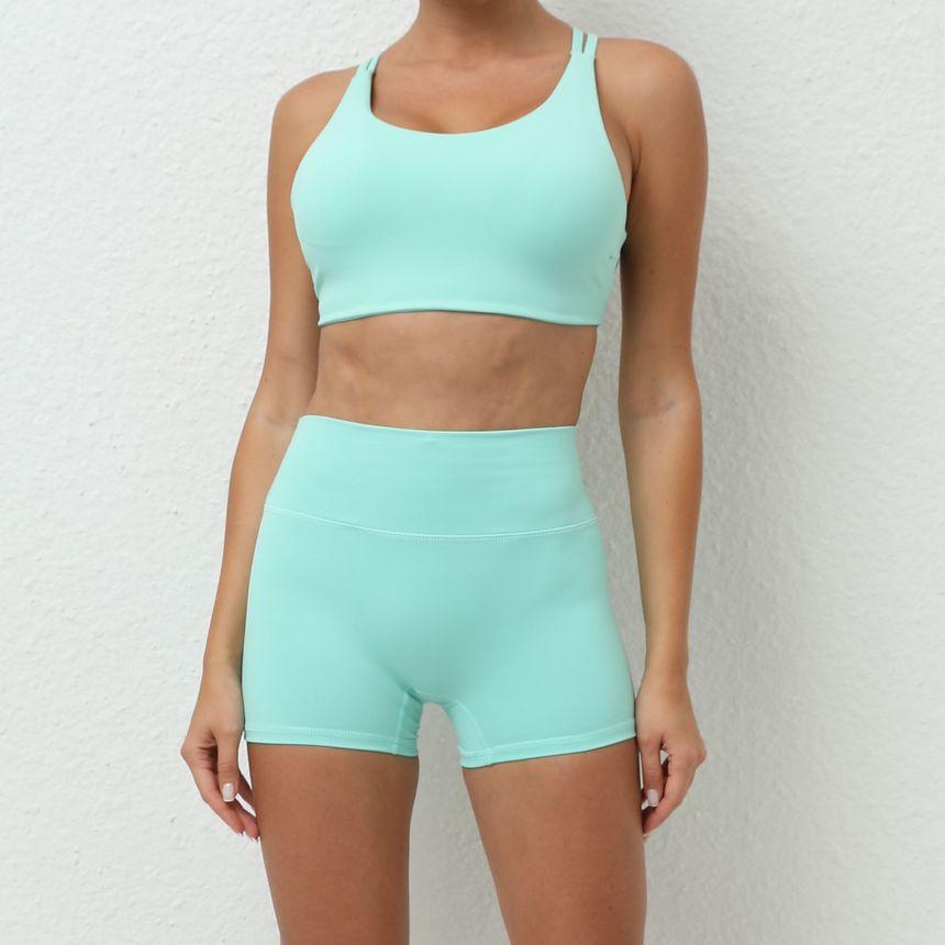 Set: Plain Criss Cross Sports Bra + Yoga Shorts Product Image