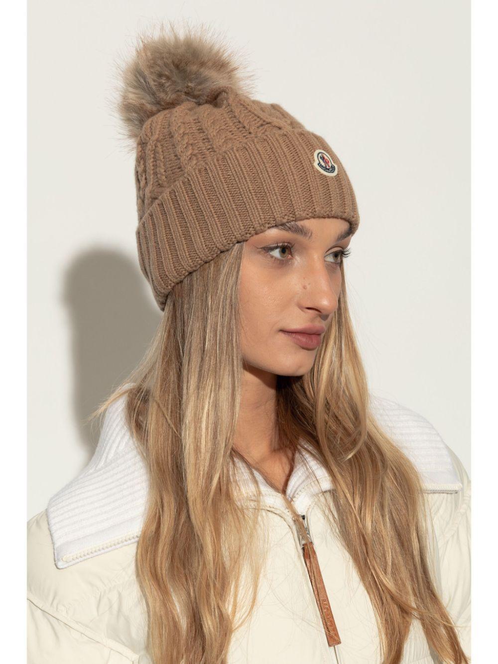 MONCLER Pom Pom Embellished Knitted Beanie In Beige Product Image