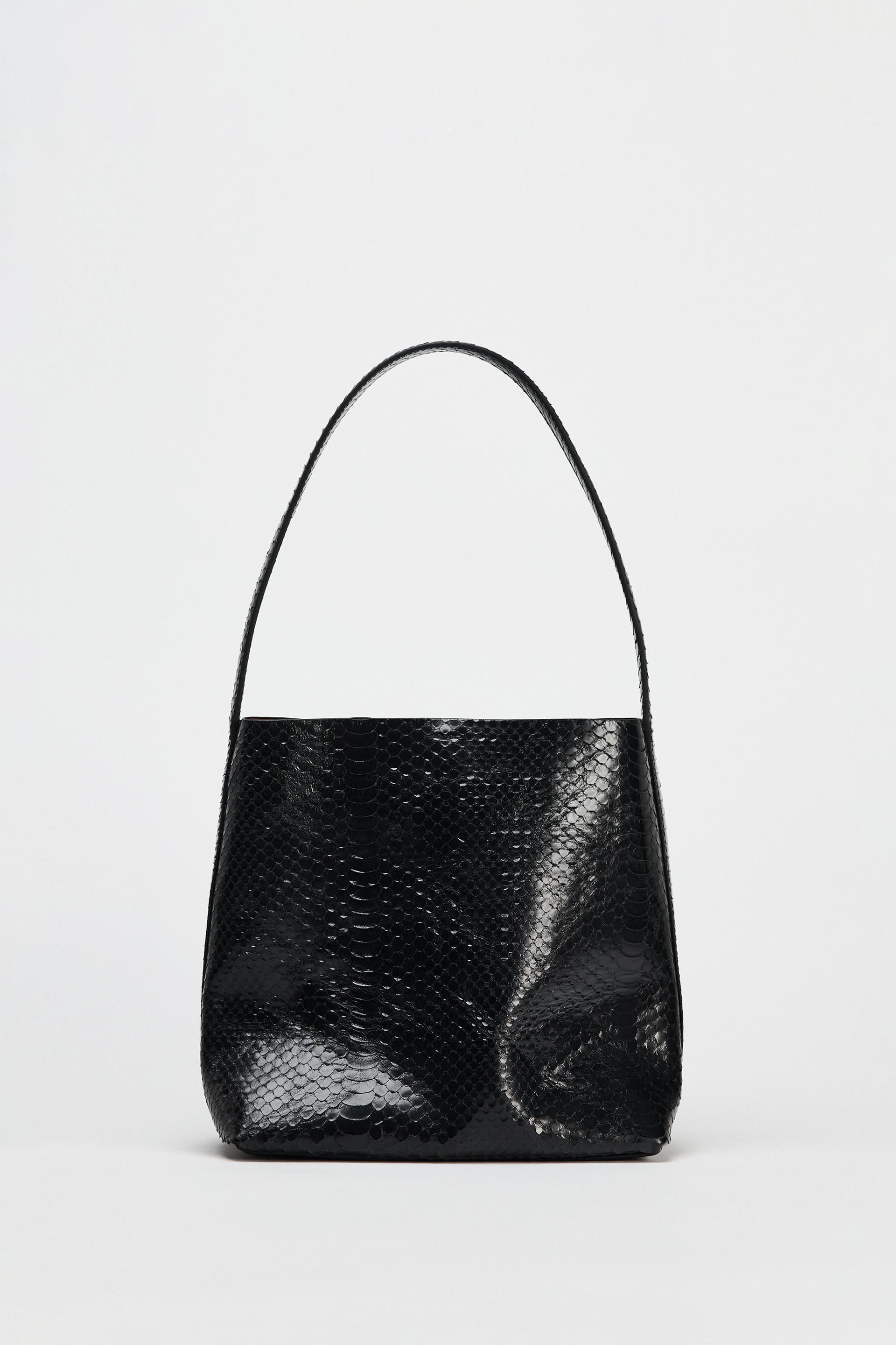 EMBOSSED LEATHER BUCKET BAG Product Image