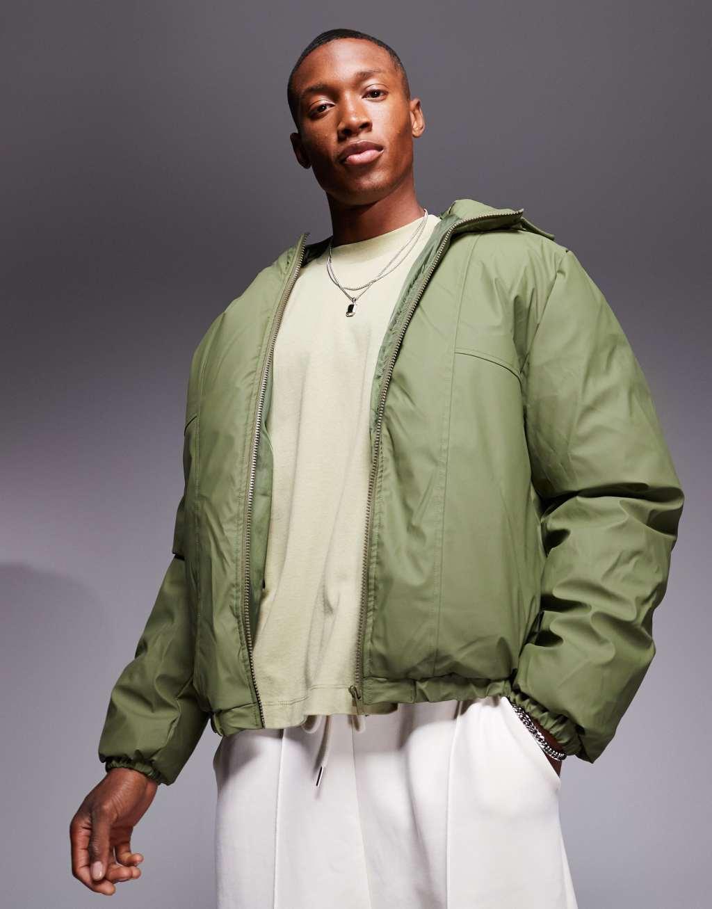 ASOS DESIGN rain resistant rubberized puffer jacket in green Product Image