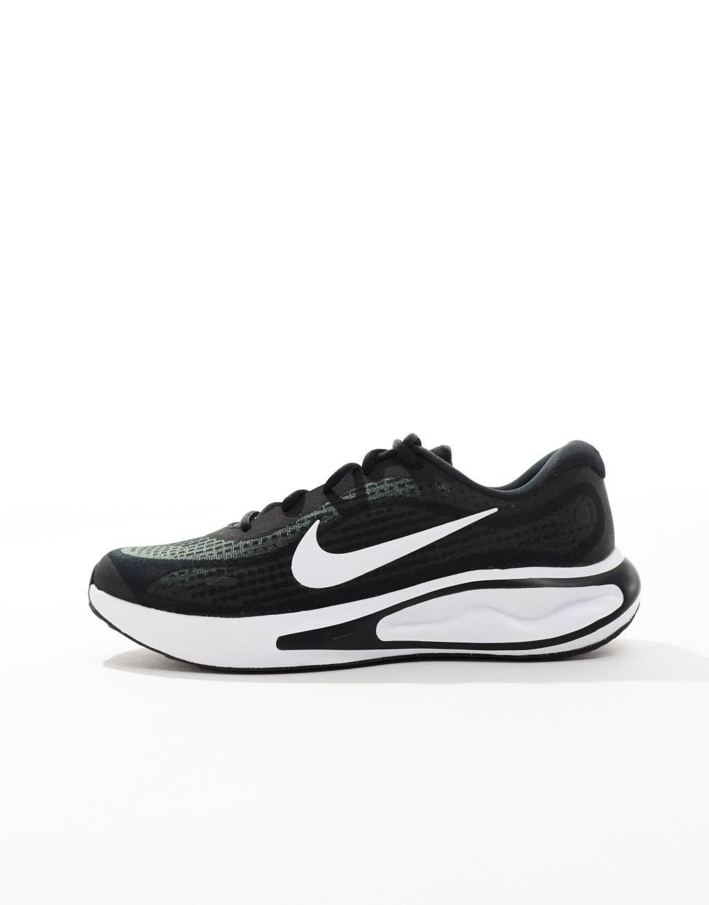 Nike Running Journey Run sneakers in black and white Product Image