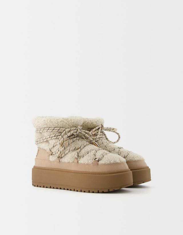 Faux shearling ankle boots with lace detail Product Image