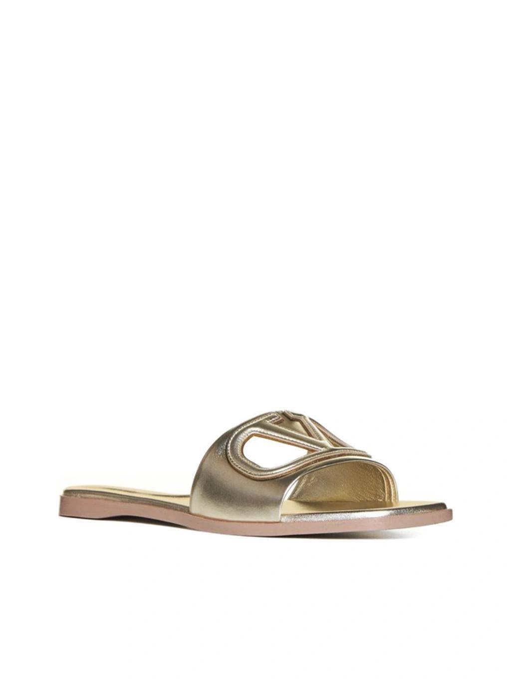 VALENTINO GARAVANI Gold Vlogo Cutout Laminated Nappa Leather Sandals In Platinum Antique Brass Product Image