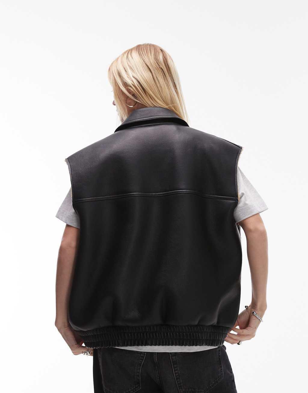 Topshop faux leather shearling vest in black Product Image