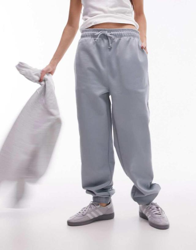 Topshop oversized cuffed sweatpants in soft blue Product Image