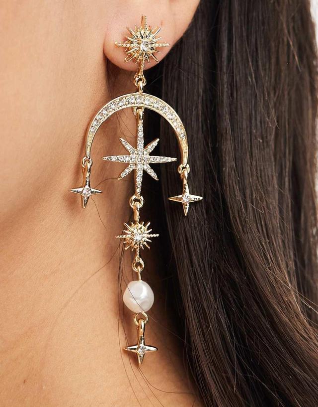 ASOS DESIGN drop earrings with celestial crystal and faux pearl detail in gold tone Product Image