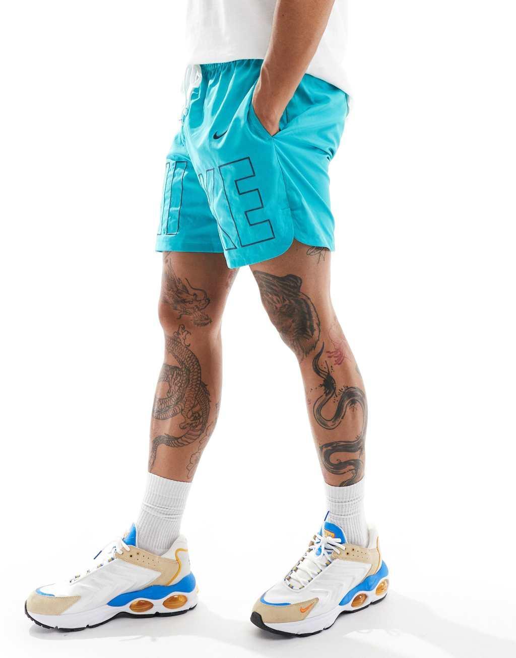 Nike Club woven logo printed shorts in aqua Product Image