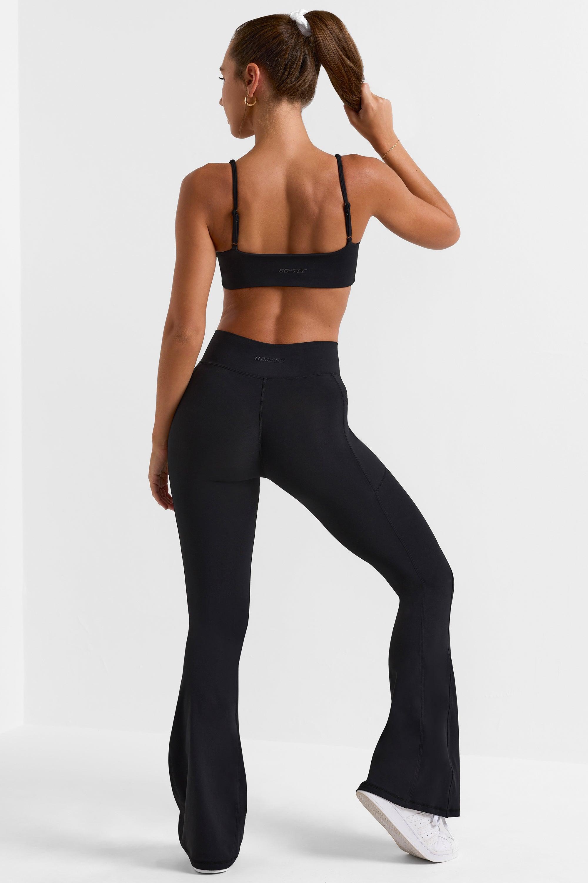 Soft Active Wrap Over Flared Leggings in Black Product Image