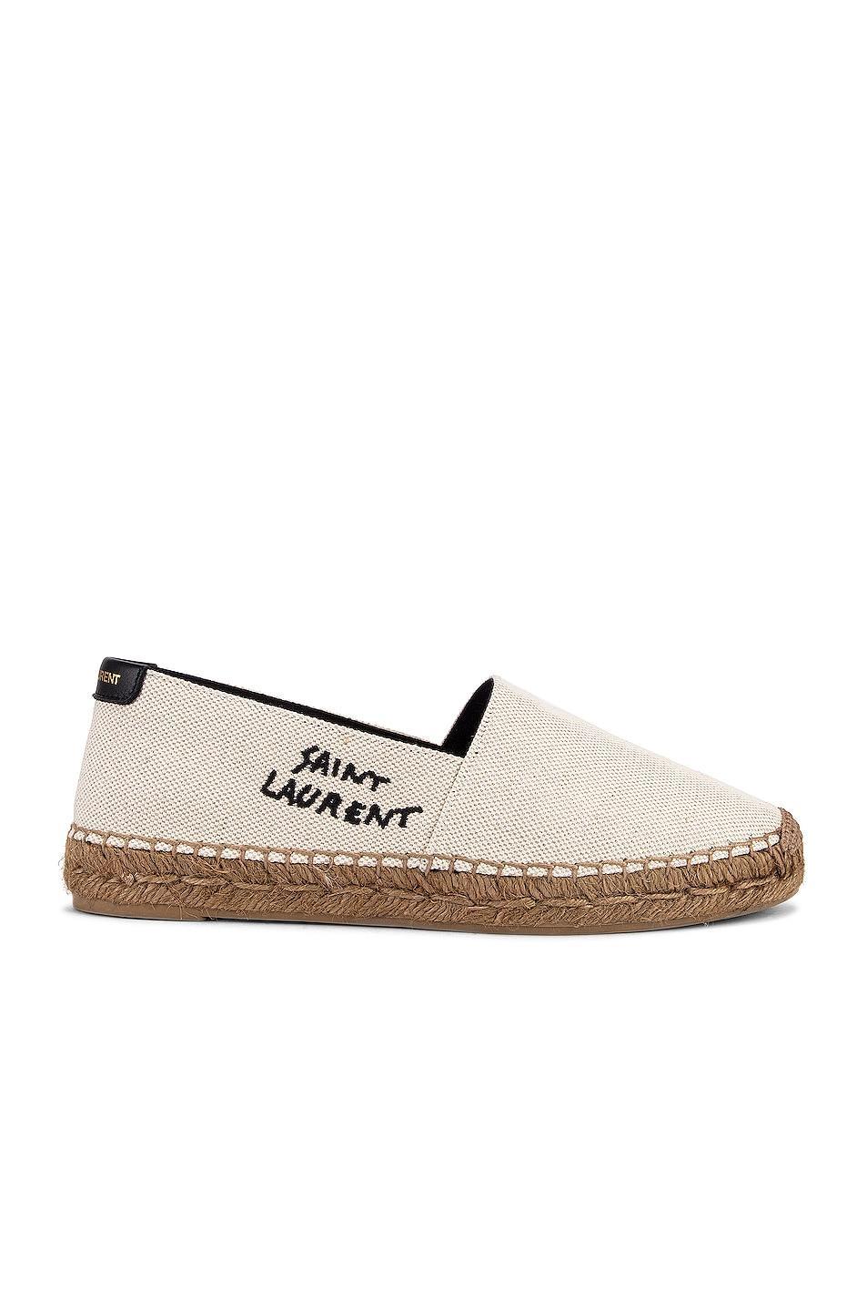 Saint Laurent Signature Espadrilles in White & Black - White. Size 40.5 (also in 35.5, 36, 36.5, 37, 37.5, 38, 38.5, 39, 39.5, 40). Product Image