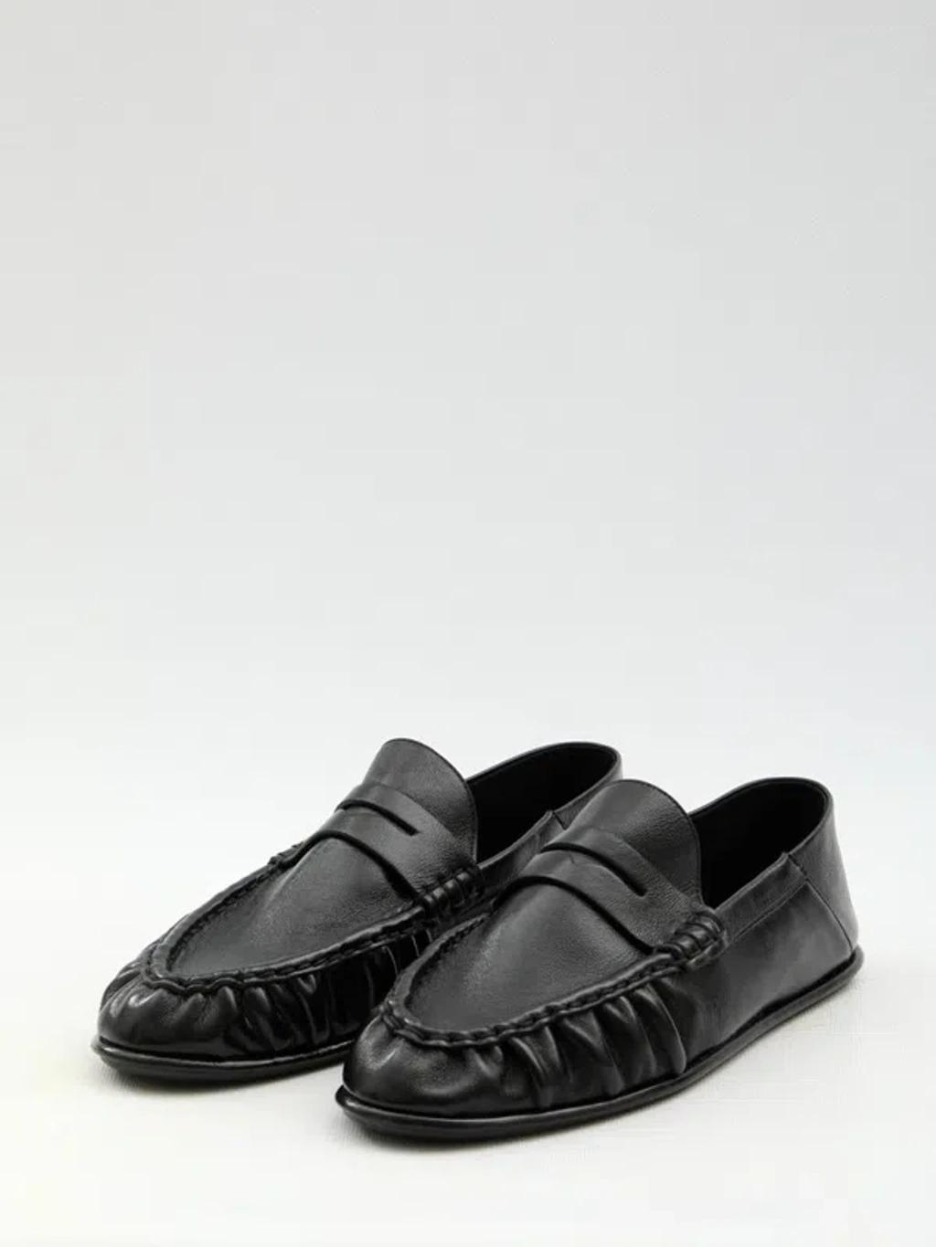 SAINT LAURENT Le Loafer Penny Slippers In Black Product Image