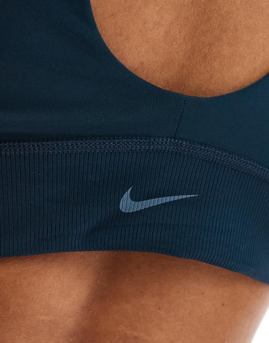 Nike Training One wrapped light support sports bra in navy Product Image