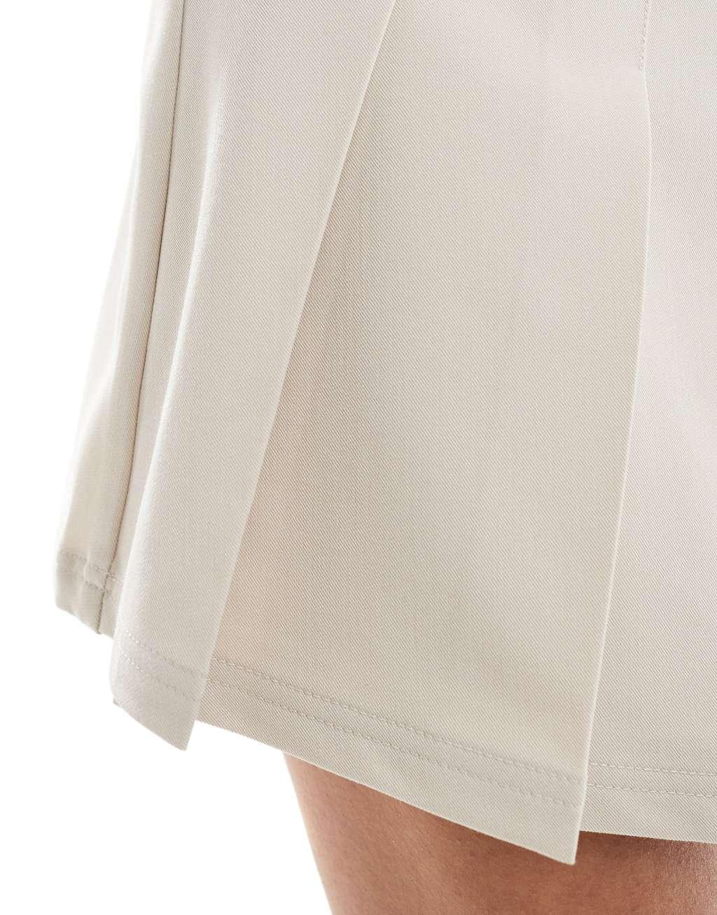 Urban Revivo pleated mini kilt skirt in camel Product Image