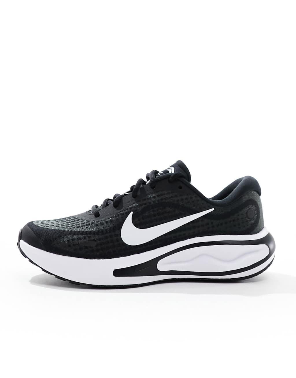 Nike Running Journey Run sneakers in black and white Product Image