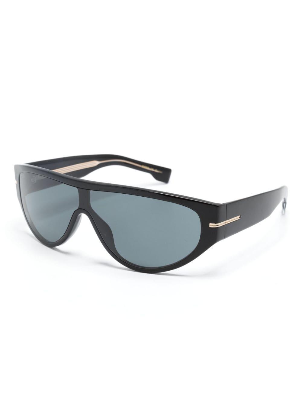 Blue-tinted Oval-frame Sunglasses In Schwarz Product Image