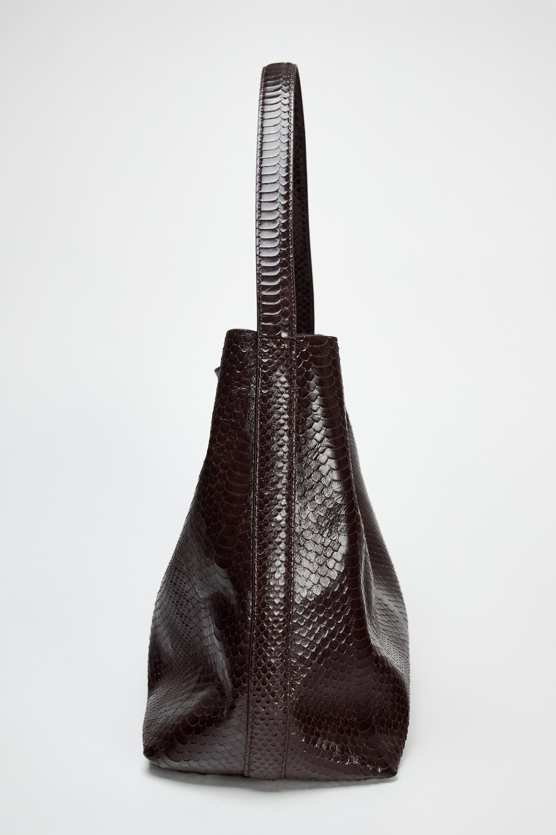 EMBOSSED LEATHER MAXI BUCKET BAG Product Image