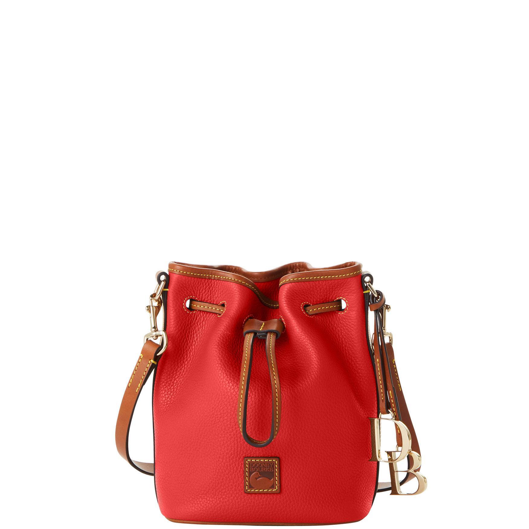 Dooney & Bourke Womens Pebble Grain Small Drawstring Leather Crossbody Bag in Jeans Product Image