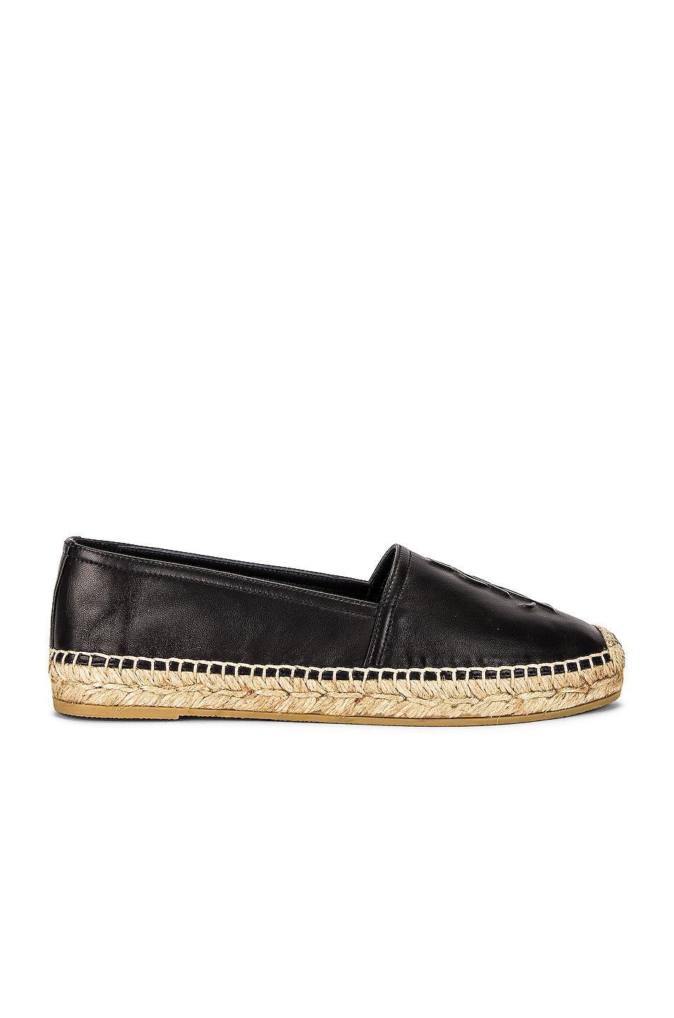 Saint Laurent Logo Flat Espadrille in Black - Black. Size 36 (also in 35, 35.5, 36.5, 37, 37.5, 38, 38.5, 39, 39.5, 40). Product Image