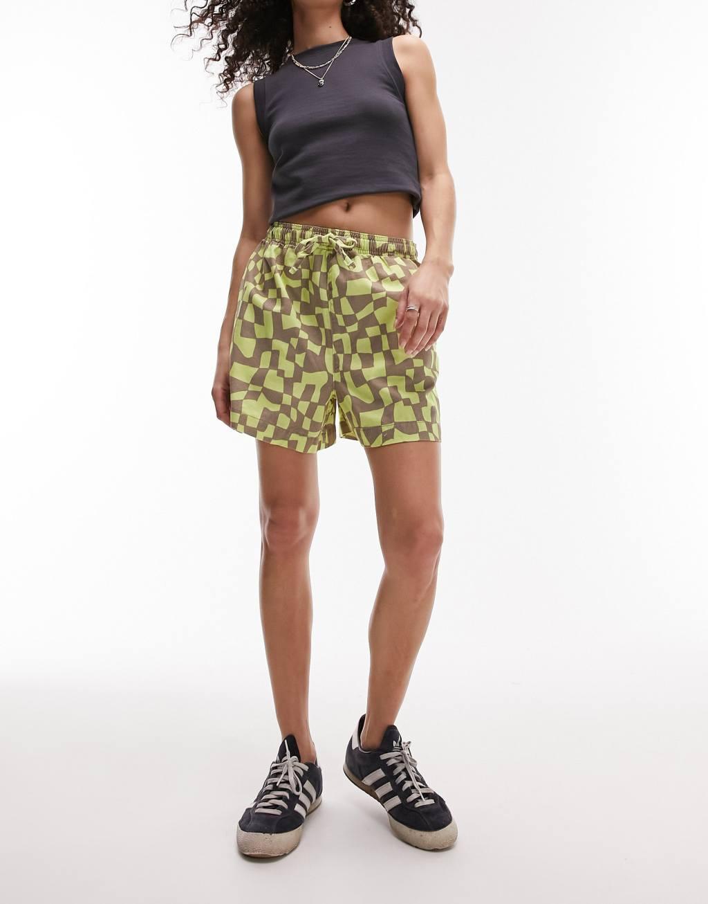 Topshop abstract checkered print runner shorts in green Product Image