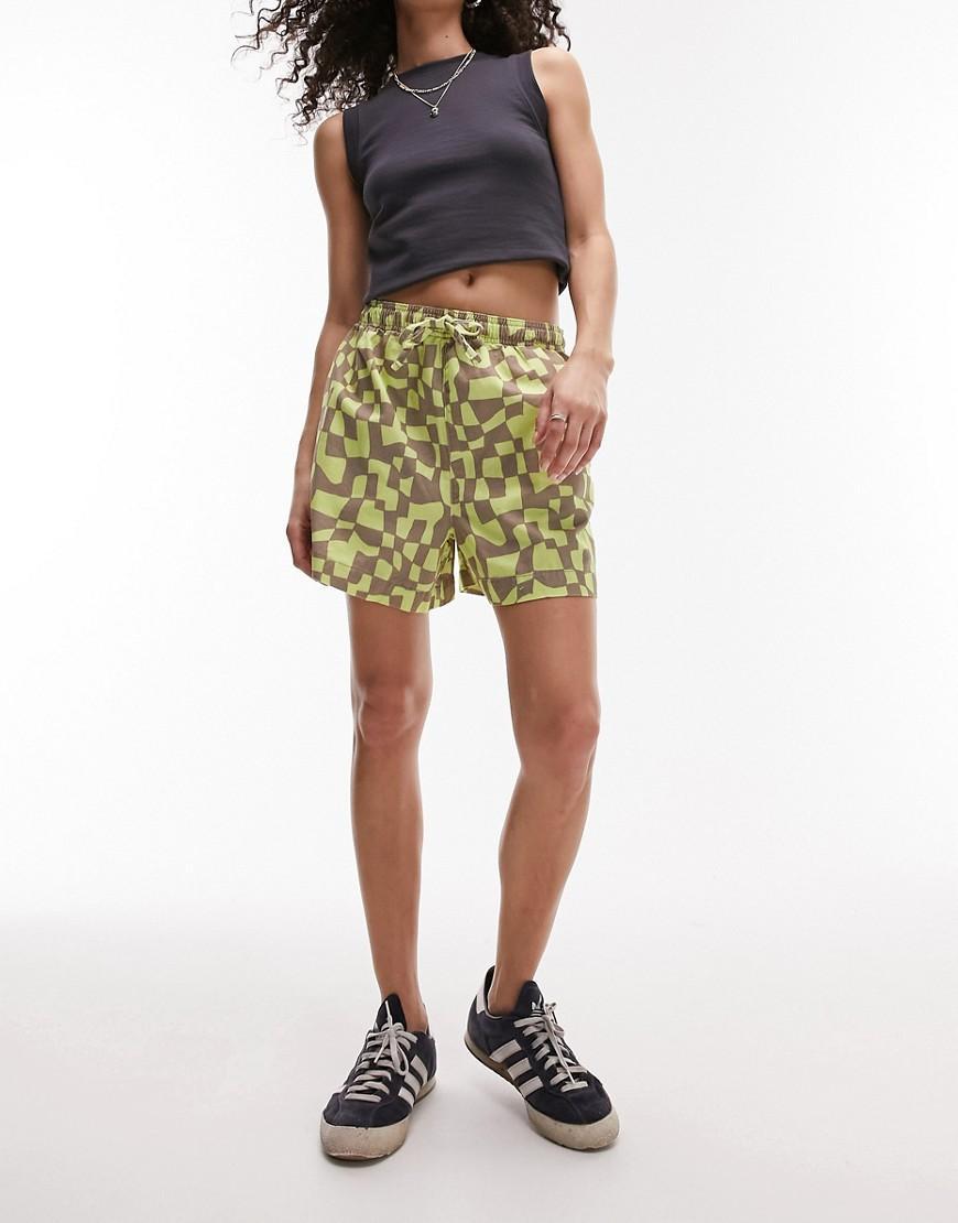 Topshop abstract checkered print runner shorts in green Product Image