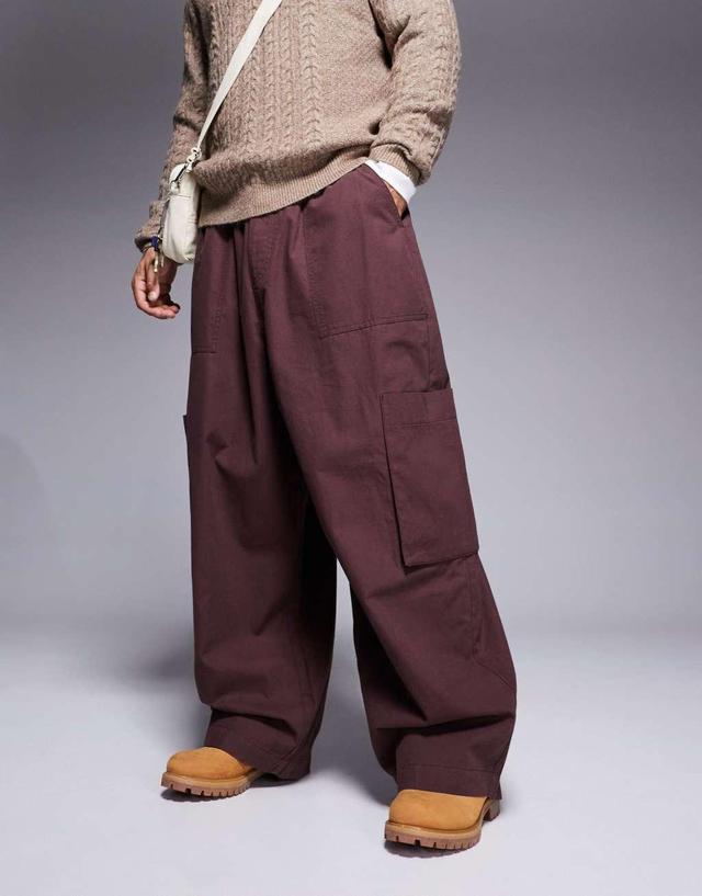 ASOS DESIGN oversized balloon cargo pants with elasticated waist in brown Product Image