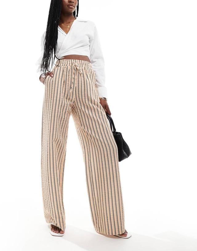 ASOS DESIGN seersucker tie waist wide leg pants in natural stripe Product Image