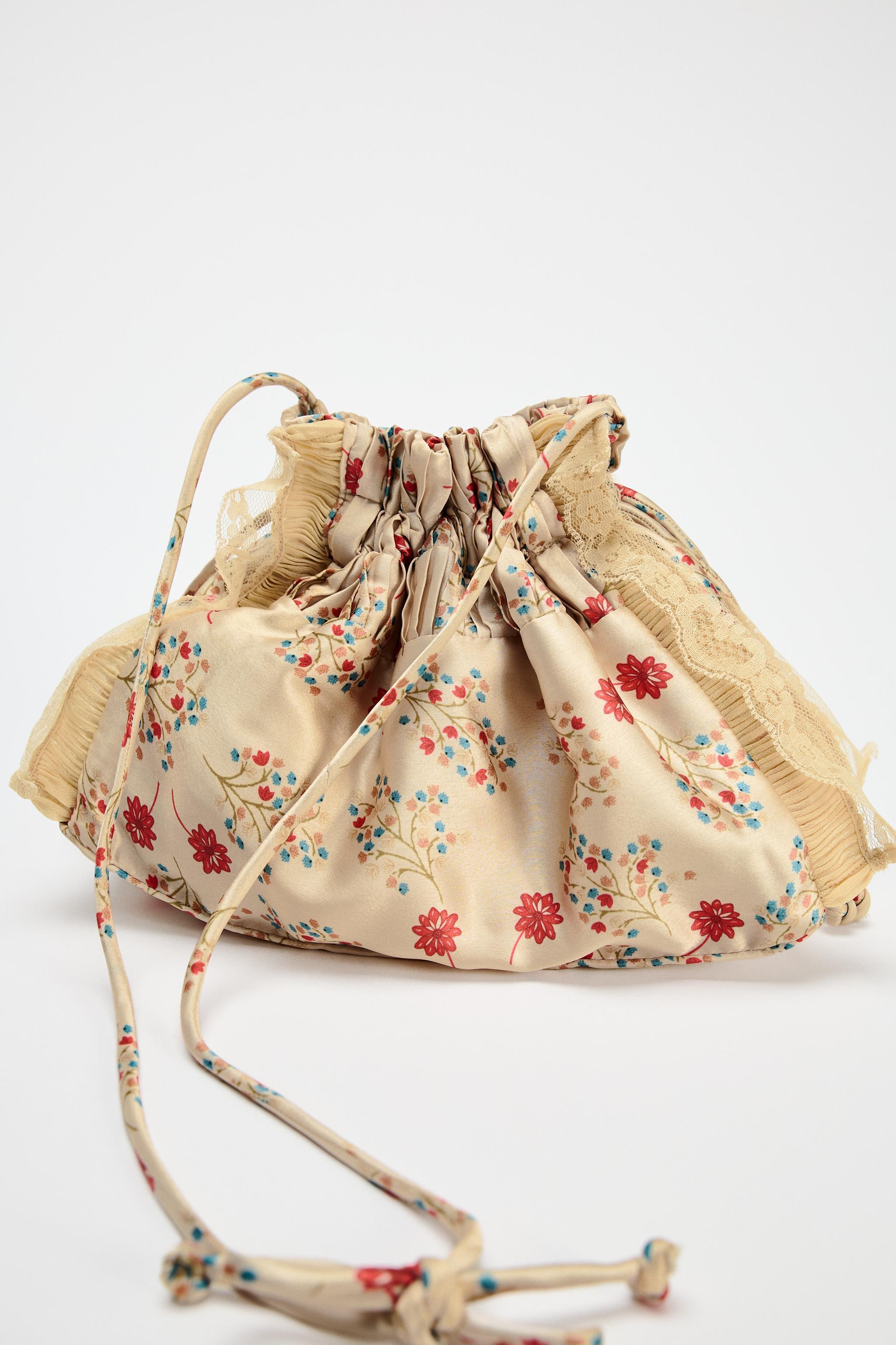 MINI FLORAL CROSSBODY BUCKET BAG Product Image