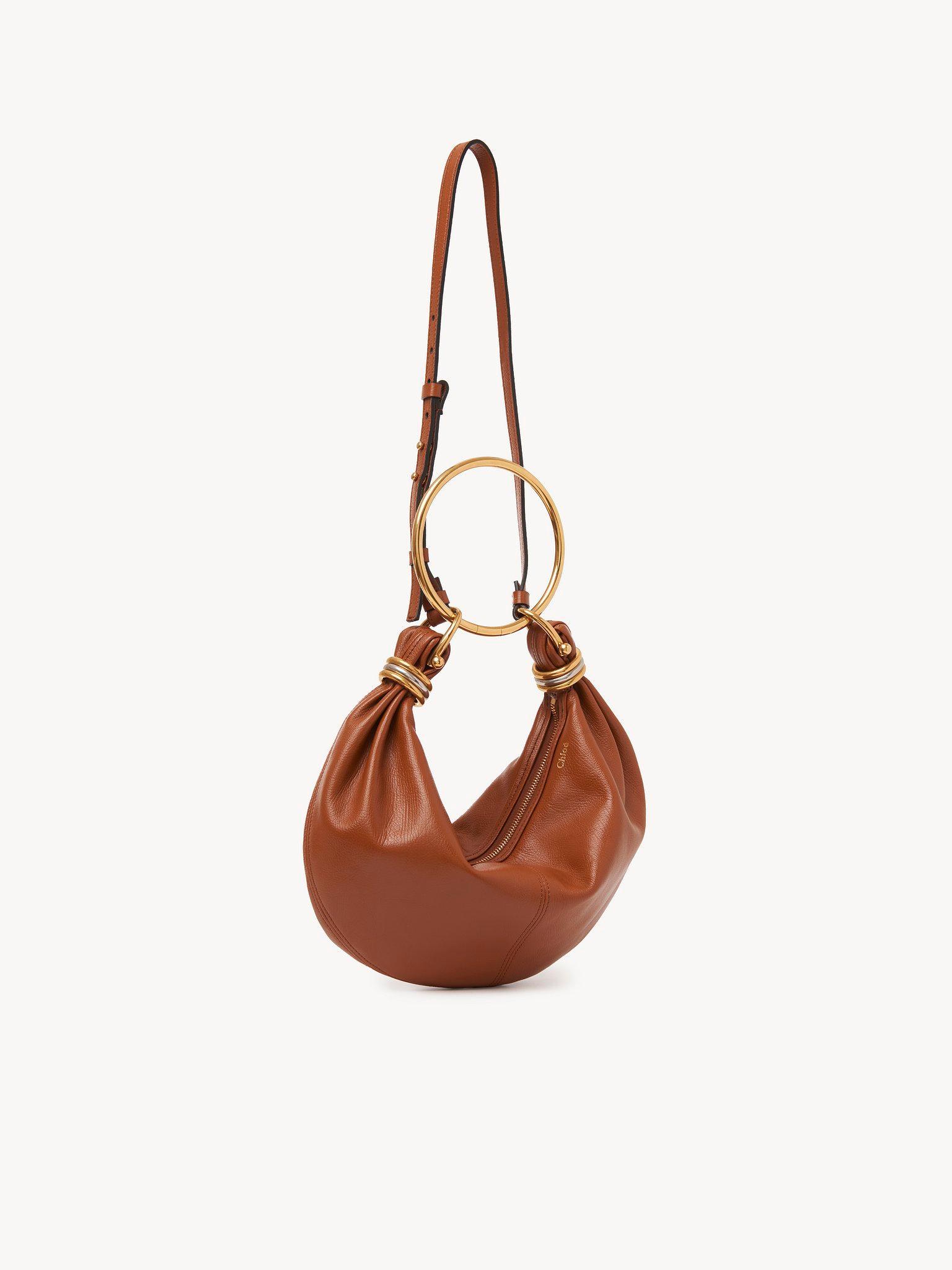 Small Bracelet Hobo bag in grained leather Product Image