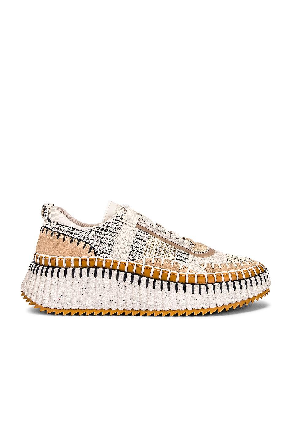 Chloe Nama Low Top Sneakers in Biscotti Beige - Beige. Size 35 (also in 37, 39). Product Image