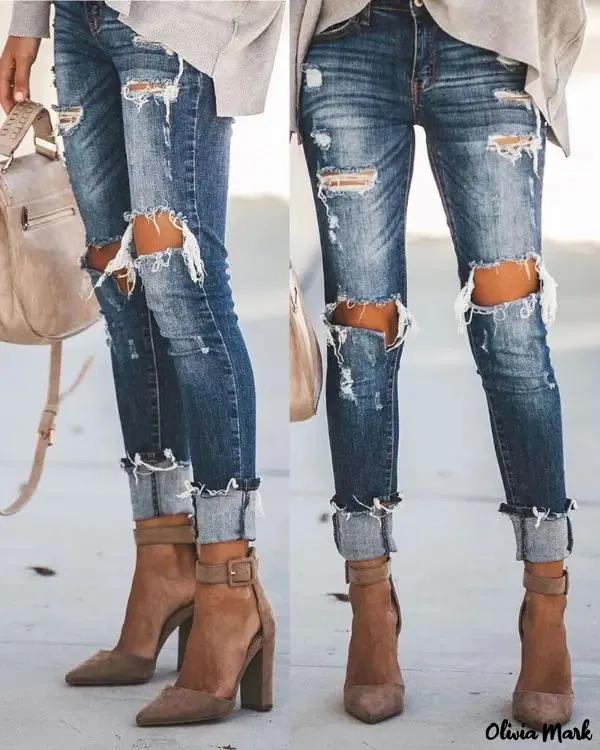 Olivia Mark – Cut-out ripped high-rise jeans Product Image