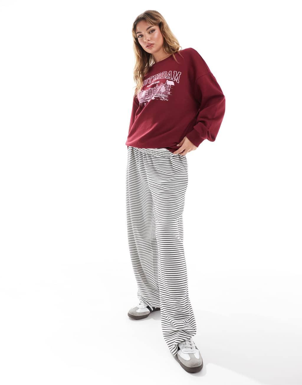 ASOS DESIGN oversized sweatshirt with Amsterdam puff print graphic in burgundy Product Image