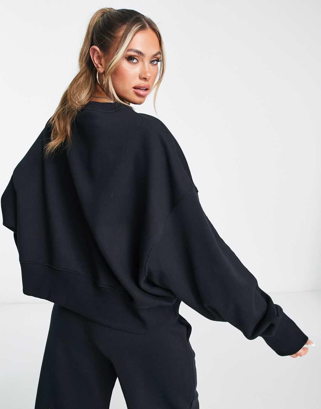 Nike Phoenix fleece super oversized sweatshirt in black Product Image