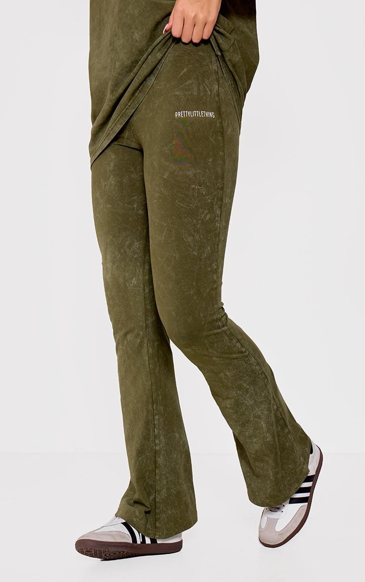 PRETTYLITTLETHING Khaki Print Washed High Waist Flared Pants Product Image