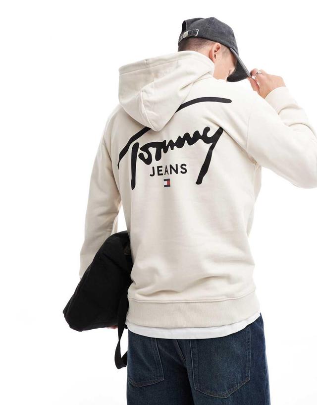 Tommy Jeans signature backprint logo hoodie in off white Product Image