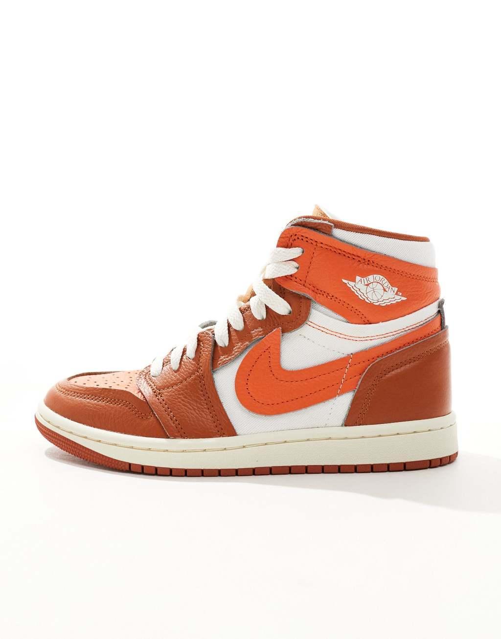 Nike Air Jordan 1 high sneakers in white and orange  Product Image