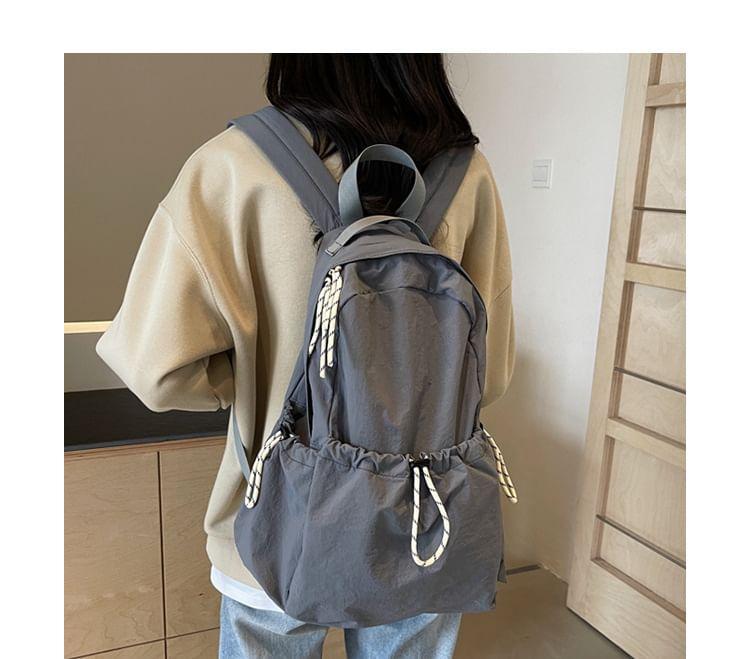 Drawstring Multi-Pocket Backpack Product Image