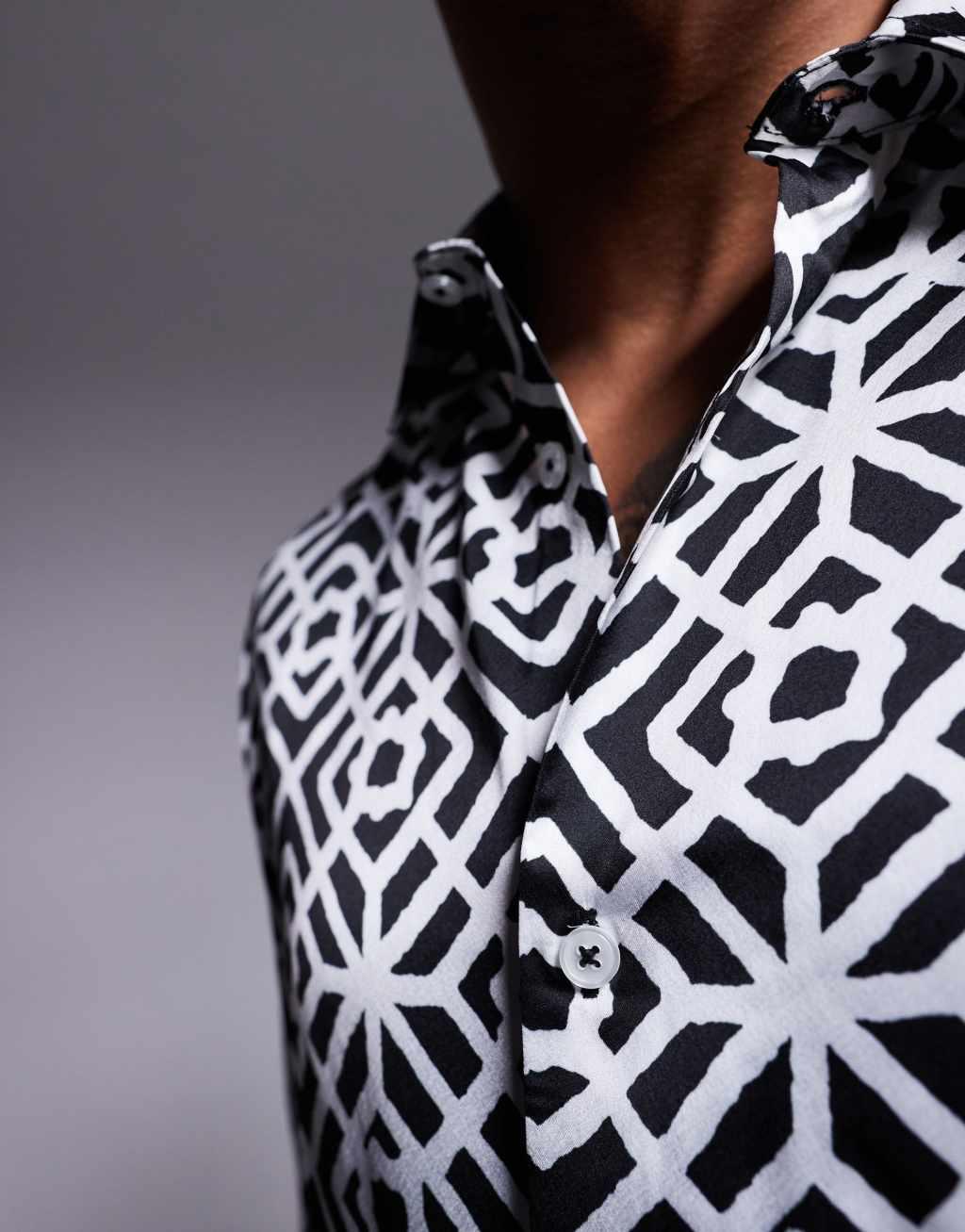 ASOS DESIGN boxy relaxed shirt with geo print in black and white Product Image