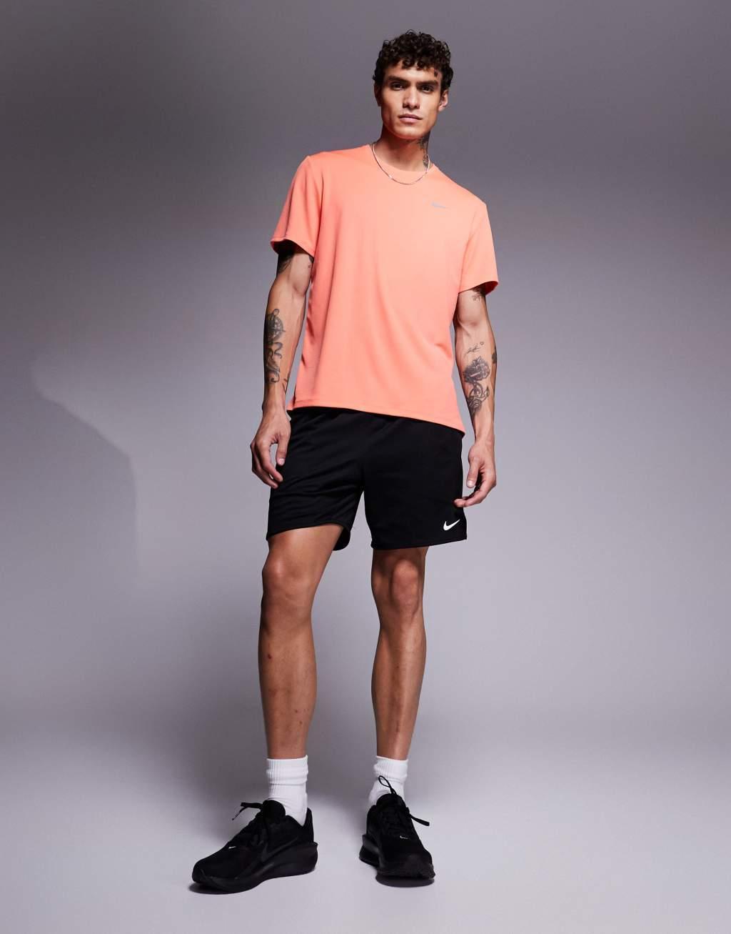 Nike Running Miler Dri-FIT t-shirt in orange Product Image