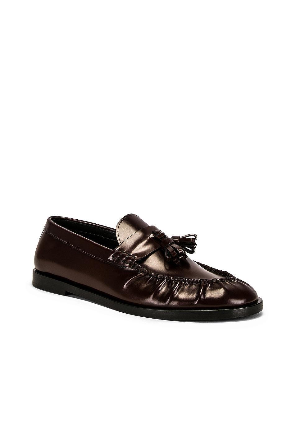 The Row Men's Loafers in Black - Black. Size 37 (also in 36, 36.5, 38, 38.5, 39, 39.5, 40, 41). Product Image