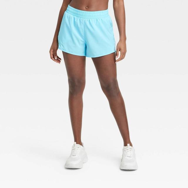 Womens Woven Mid-Rise Run Shorts 3 - All In Motion Light Blue L Product Image