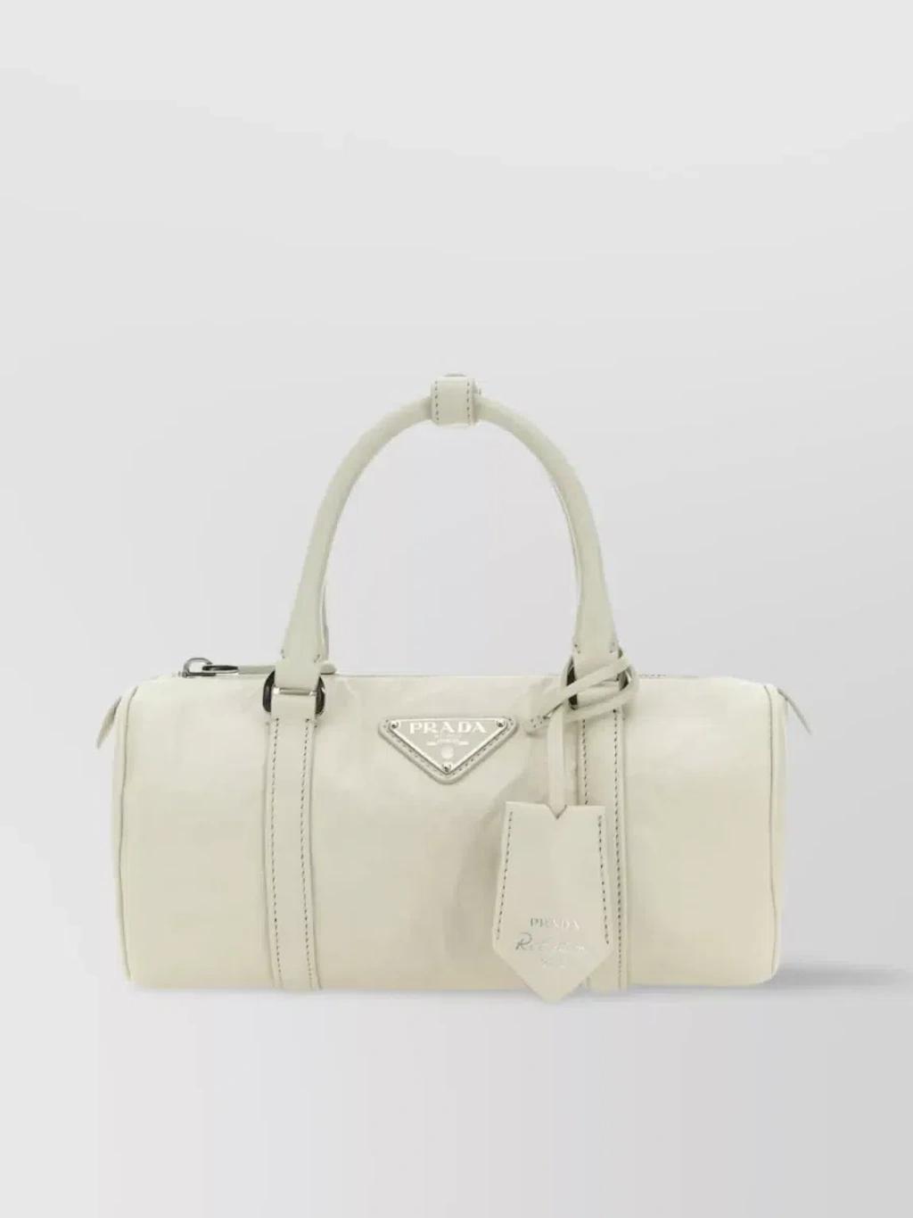 Small Leather Handbag With Detachable Strap And Accessory In Cream product image