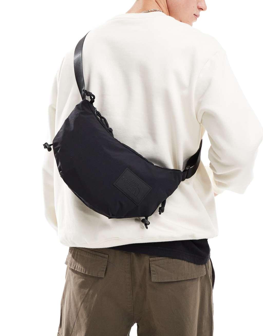 The North Face Never Stop sling cross body bag in black Product Image