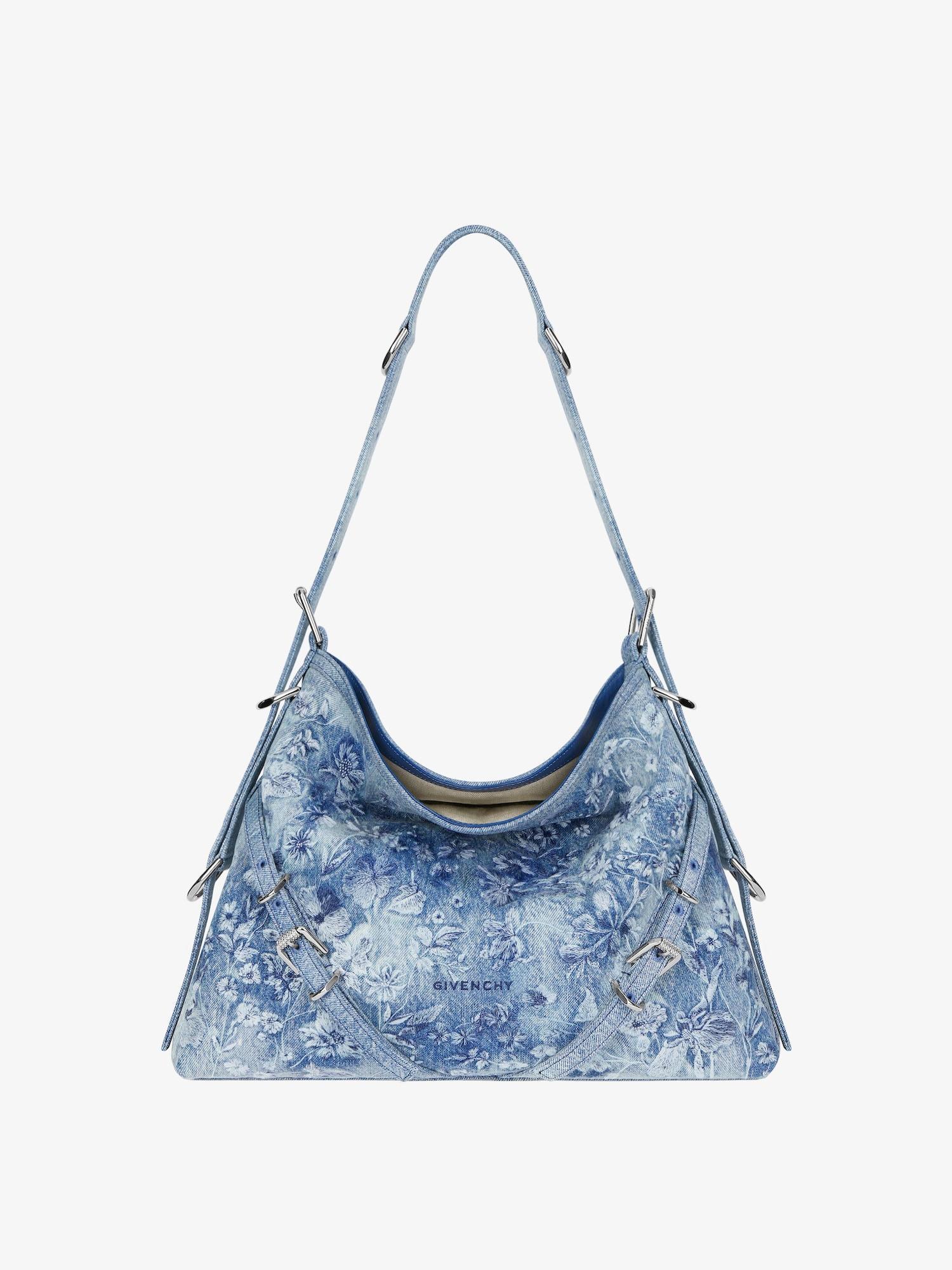 Medium Voyou bag in washed embroidered denim Product Image