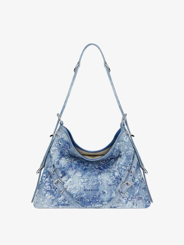 Medium Voyou bag in washed embroidered denim Product Image