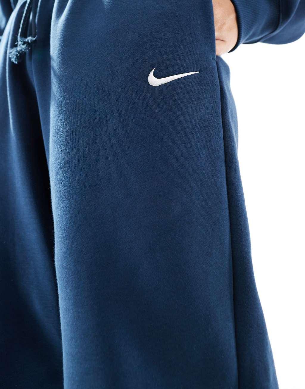 Nike Mini Swoosh sweatpants in navy Product Image