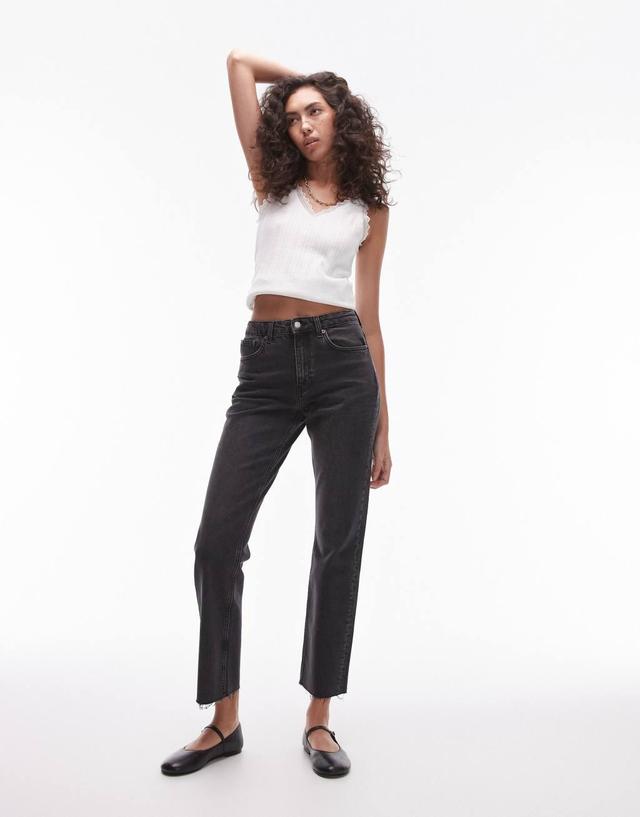 Topshop Tall cropped mid rise straight jeans with raw hems in washed black Product Image