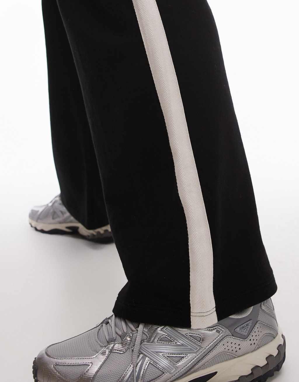 Topman baggy leg sweatpants with contrast side stripe in black Product Image