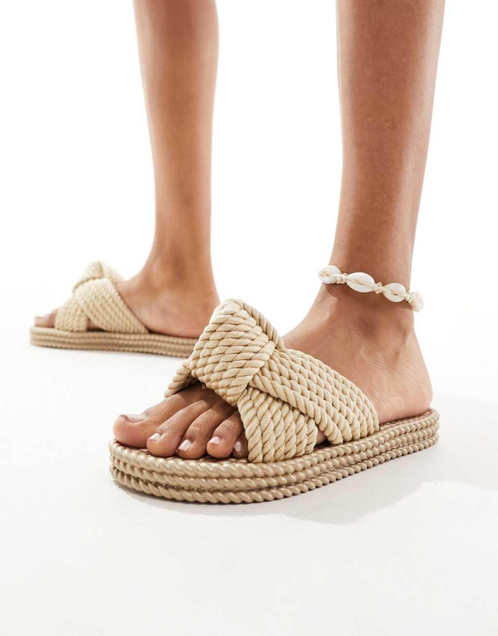 ASOS DESIGN Jasper knot jelly sandals in gold Product Image